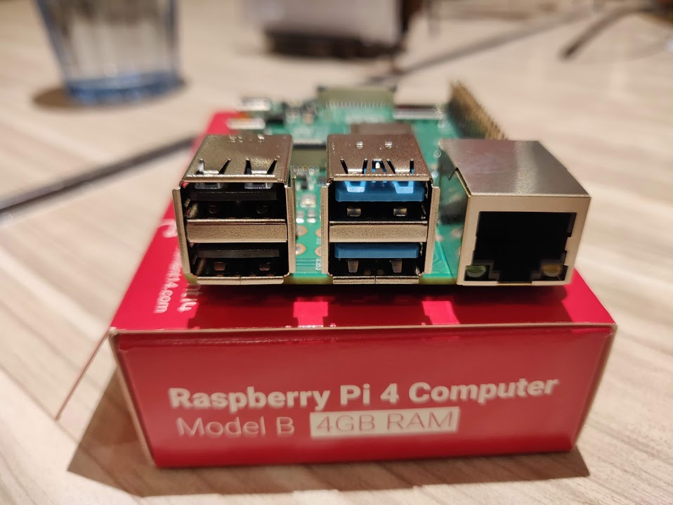 Raspberry Pi 4 on top of the box, showing the USB ports and the Ethernet port